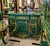 Make a grand statement with this Monumental Louis XVI Style Commode Cabinet, finished in a rich emerald bottle green tone...