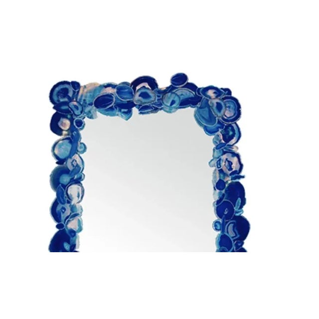 This mirror is a reminder of the years Marjorie spent living on the island of Corfu in the 1970s. The fabulous colours of...