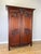 An impressive Antique French wardrobe with an elegant tall form, richly carved floral decoration and an ornate two-door...