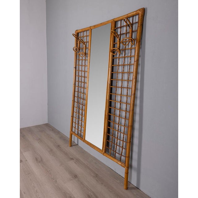 Wall coat rack with bamboo structure and central mirror, Italian design, 1960s.