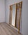Wall coat rack with bamboo structure and central mirror, Italian design, 1960s.