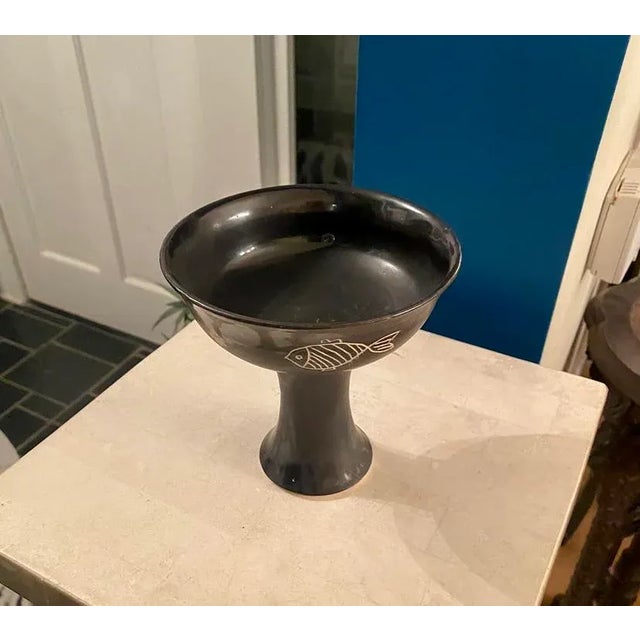 Unique Japanese black, glazed pottery stem cup Age: unknown Height: 5.25 inches Width: 5.2 inches. Origin: Japan Estimated...