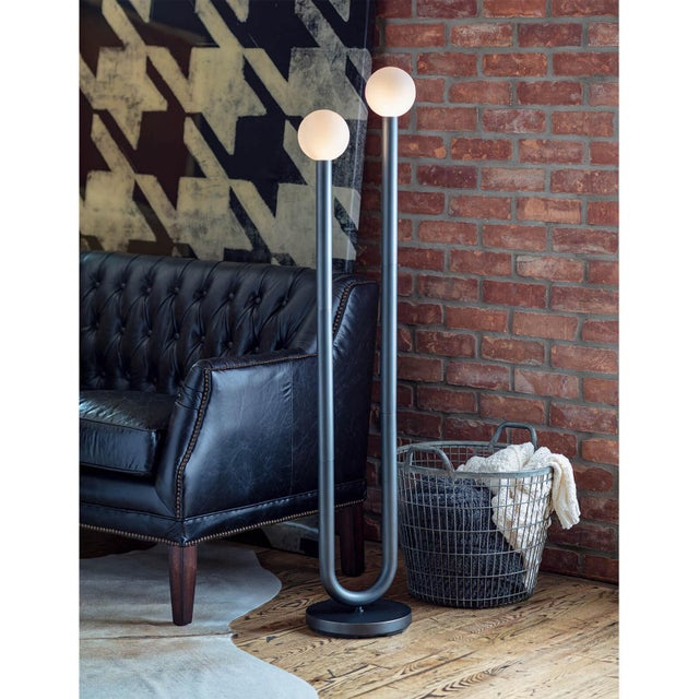 The Happy Floor Lamp is a unique mix of modern and playful. Happy's simple, asymmetrical charm creates uplifting...