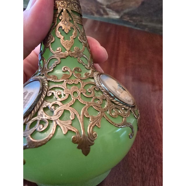 A fine antique grand tour perfume bottle with multi panels of miniature paintings ( guaranteed over 150 years old original...