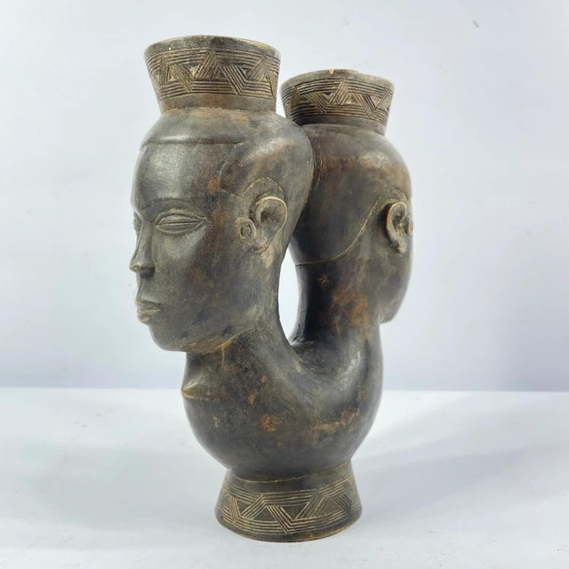The Kuba people of the Democratic Republic of the Congo are well known for their finely carved wooden objects,...