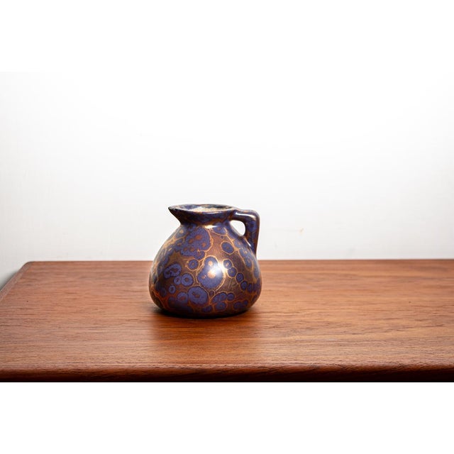 Art Nouveau Style Vase in Iridescent Purple Glazed Ceramic by Léon Pointu, 1890s, in Flawless conditions. Designed 1890 to...