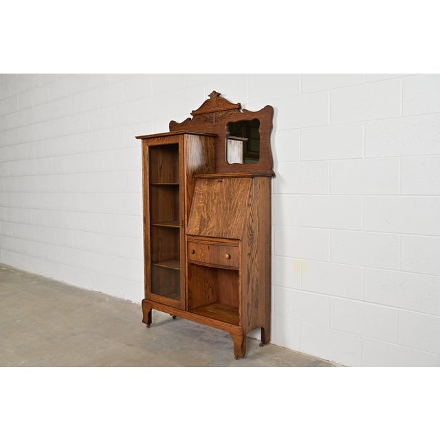 Victorian Antique Victorian Carved Tiger Oak Side-by-Side Bookcase With Drop Front Secretary Desk by Larkin Co., Circa 1900 For Sale - Image 3 of 16