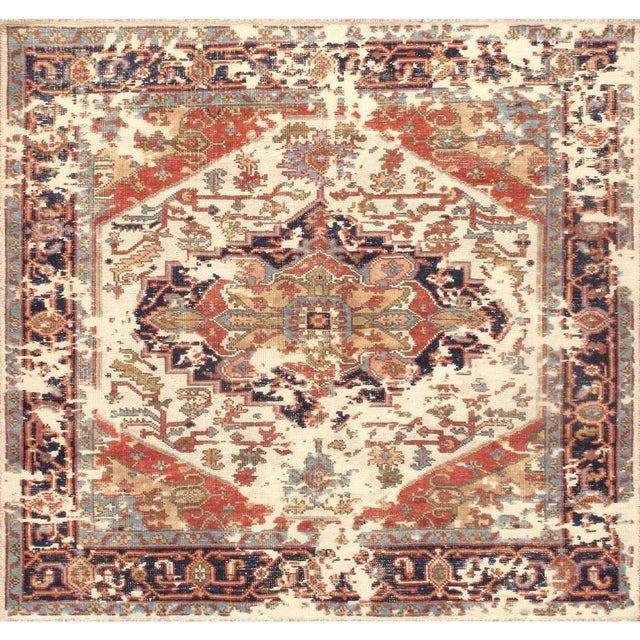 The Serapi Collection reinterprets traditional tribal geometric design through a refined palette. Each rug is hand-knotted...