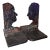 A Pair of Brutalist Cast Iron Bookends Featuring Sculptural Male and Female Profile Silhouettes For Sale