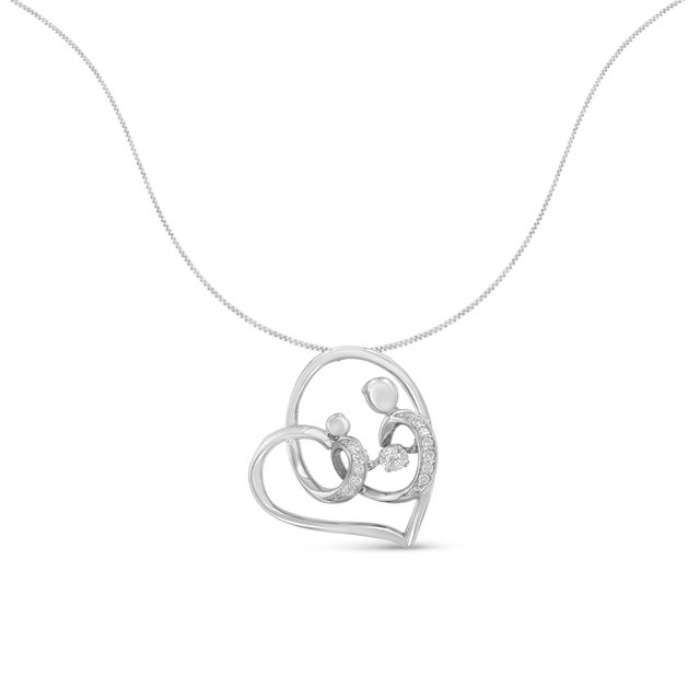 Celebrate the joys of motherhood with this sentimental sterling silver pendant necklace. A mother and child figure is set...