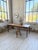 Antique solid oak farmhouse table from the 1950s, entirely pegged. We love its finely tapered legs, giving it a very...