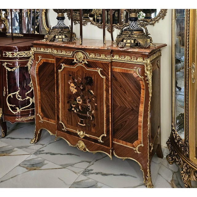 Make a statement with this impressive French-style wooden sideboard, featuring a rich dark wood finish accented by...