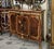 Make a statement with this impressive French-style wooden sideboard, featuring a rich dark wood finish accented by...