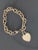 Tiffany & Company charm bracelet from late 80's. Comes with it's original Dustbag. The engraving is of superb quality from...