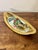 A striking Mid-Century Modern hand-wrought brass tray by Salvador Teran, featuring a vibrant mosaic glass depiction of...