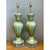 Showcasing masterful Italian craftsmanship, this exceptional pair of mid-century Murano table lamps features elegantly...