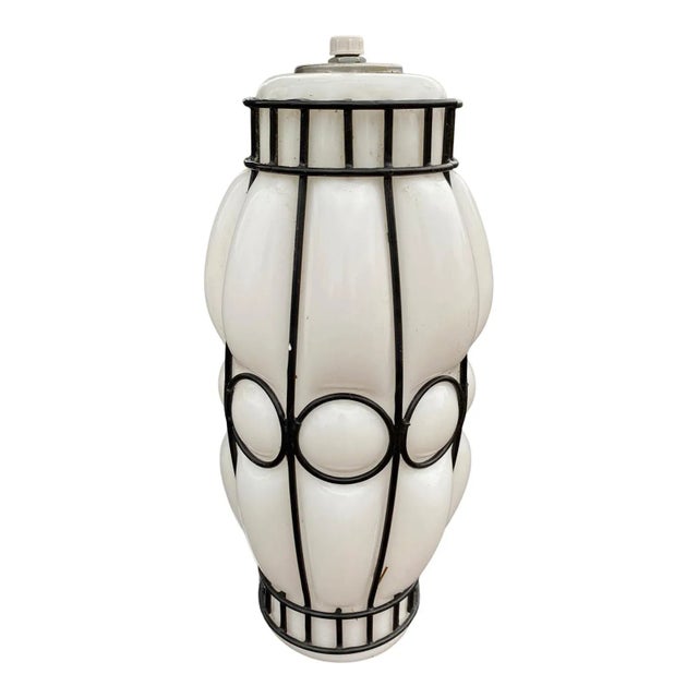 Mid century 1950s blown glass pendant light by Moe Lightning with Murano glass shade blown in cage truly amazing was...