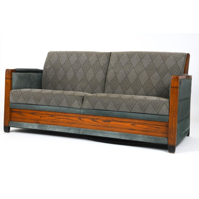 A very nicely proportioned retro art deco Dutch Schuitema style sofa upholstered in a modernist diamond pattern fabric. A...