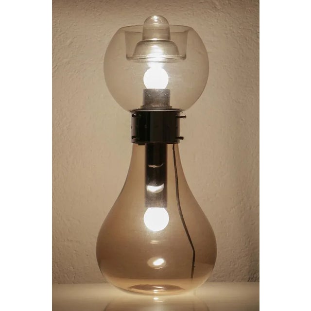 The "Birillo" table lamp was first introduced in the 1960s and quickly became popular due to its futuristic design and...