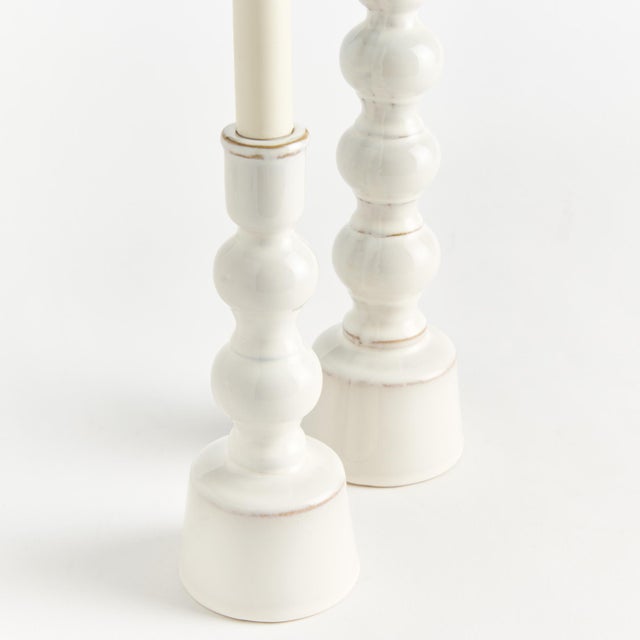 Made of a highfired, durable stoneware and finished with aCreamyWhite reactive glaze, the Caroline Taper Holders are a...