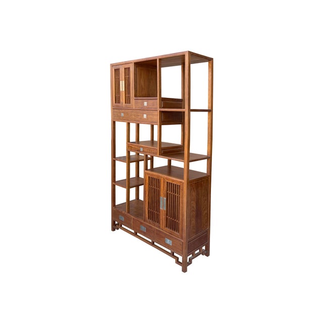 Elevate your living space with this exquisite Asian-inspired curio display cabinet, a perfect marriage of timeless...