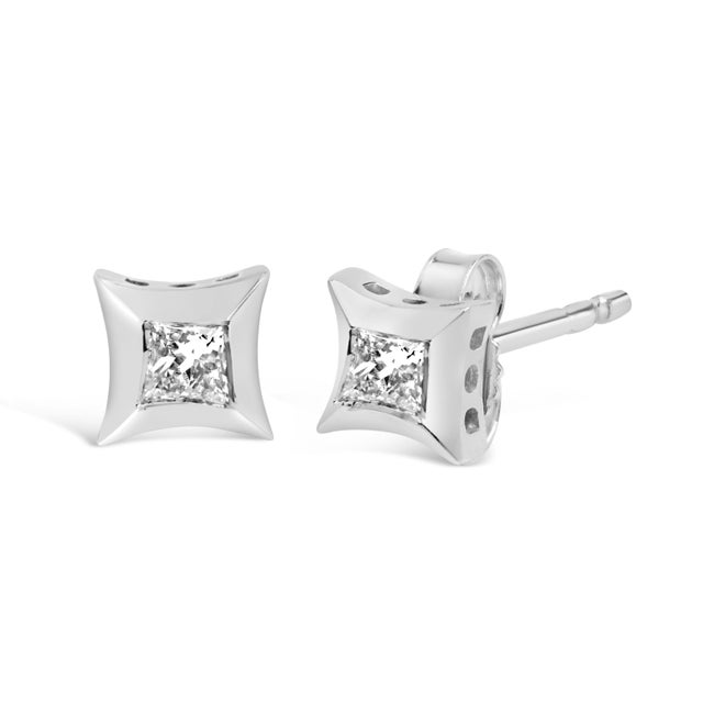 Introducing a dazzling pair of earrings that will make heads turn and hearts skip a beat. Crafted in 10K white gold, these...