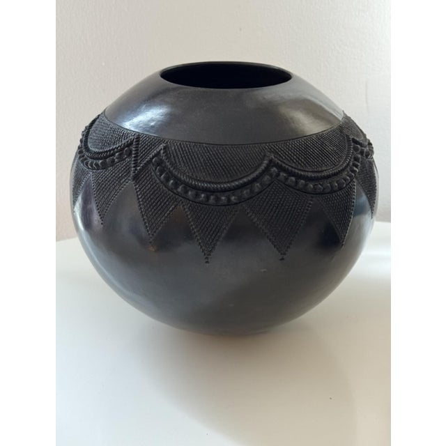 Contemporary Zulu Pottery Jar handmade by Jabu Nala Zulu ceramics play a central role in traditional Zulu ceremonies....