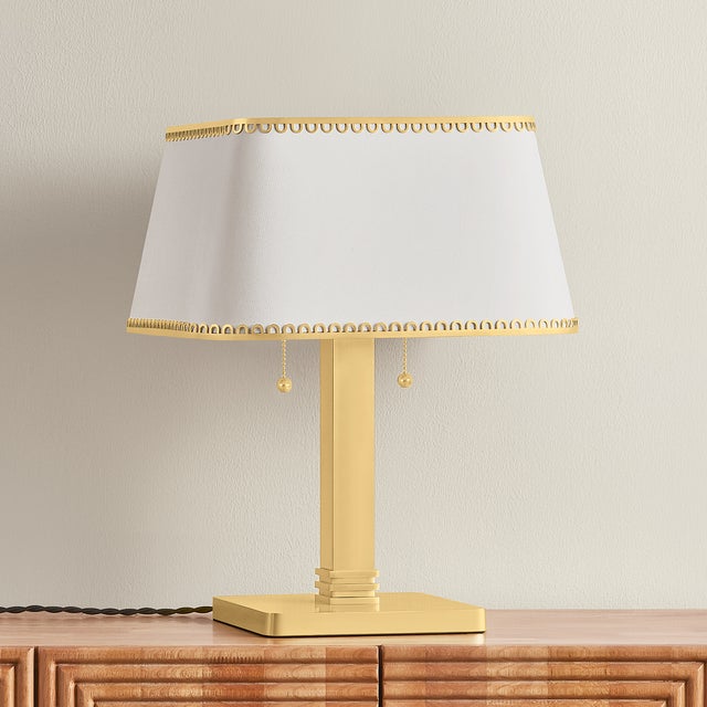 Claude brings sculptural presence to a compact form, pairing a crisp, tailored silhouette with refined, vintage-inspired...