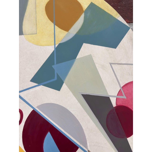 This circular oil painting features an interplay of geometric shapes and vibrant colors, creating a dynamic composition...