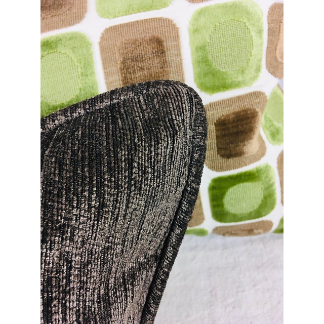 This is a Pair of modern cut velvet poca dot pillows. With tones of apple green and cocoa brown and a cream background....
