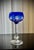 A set of five french saint-louis massenet crystal hock wine glasses with cobalt-blue cut-to-clear bowls, estimated to date...