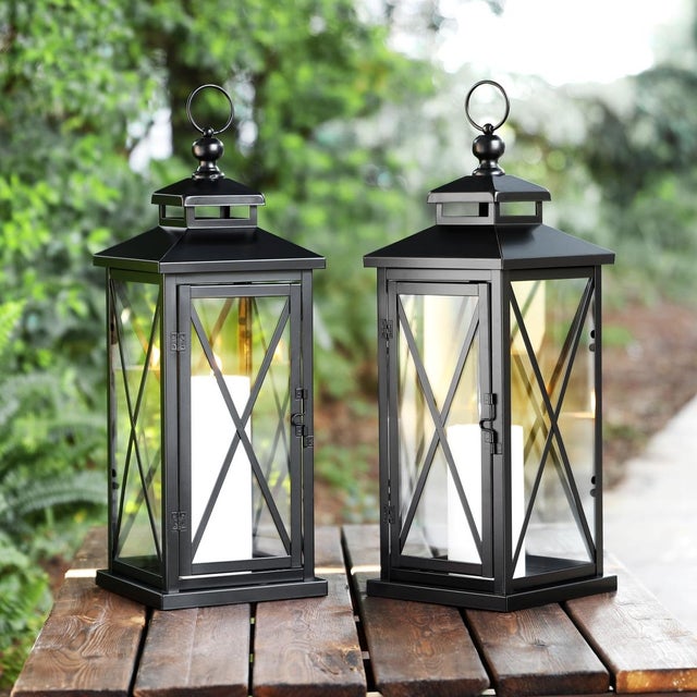 Transform your outdoor space with the elegant simplicity of the Lirio Large lantern set. Standing at an impressive 20.5...