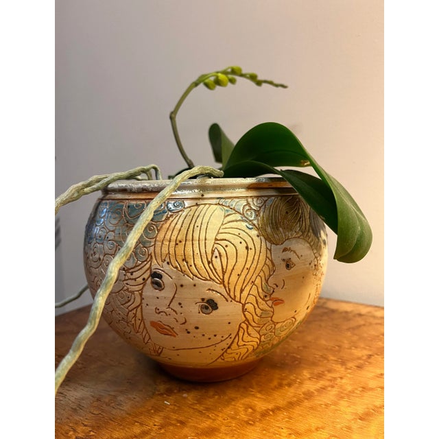 This charming bowl depicting seven children is a wonderful example of the work of William C. Alexander (1935-1988). There...