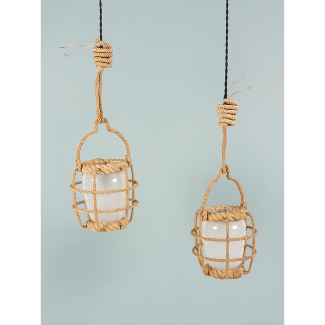 Audoux & minet pair of lanterns france, circa 1960 rope & opaline glass h (lantern): 20 cm / d: 20 cm h (total): 50 cm...