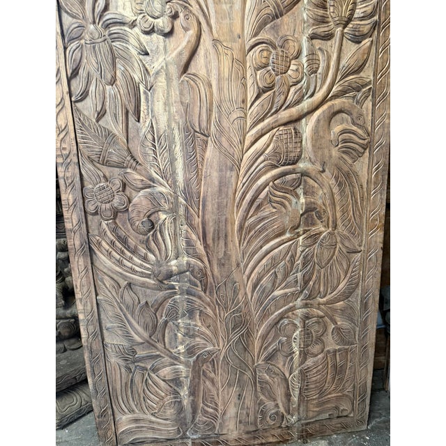 Infuse your space with meaning and artistry with this vintage Tree of Life carved wood door, a powerful symbol of growth,...