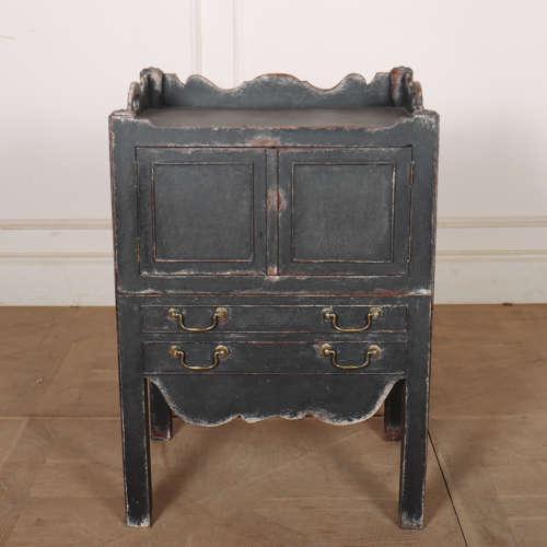 18th century English painted bedside cabinet with a tray surround and pull out drawer. 1790. This piece is designed in the...