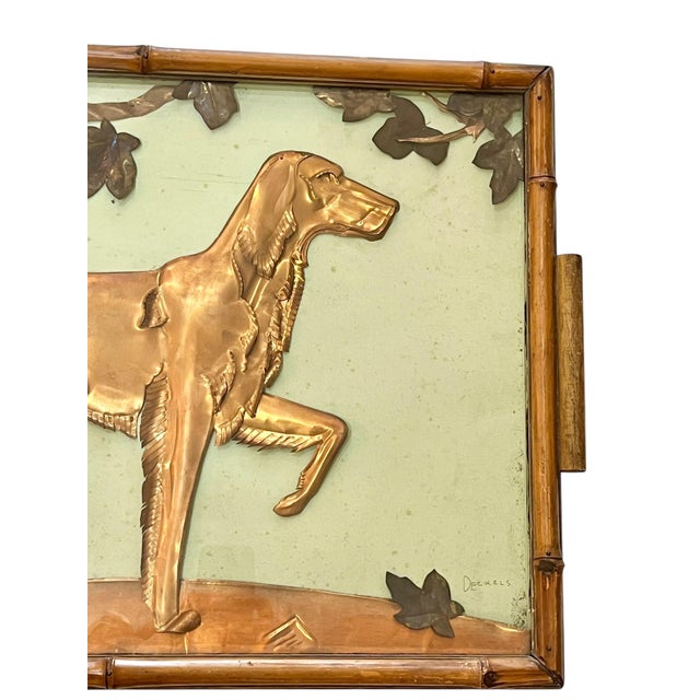 Absolutely charming vintage copper hunting dog in a bamboo and glass tray frame. Light blue/green paper background with...