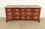 A gorgeous Georgian or Chippendale style nine-drawer block front triple dresser or credenza By Kindel Furniture,...