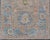 Modern Floral Oushak With Sandy-Brown Background and a Sky Blue Border 2'7" X 4'0" For Sale - Image 4 of 10