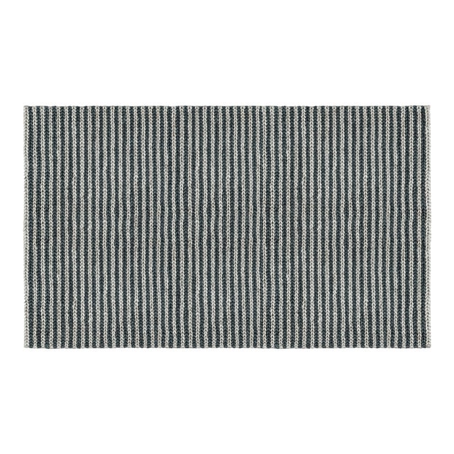 Timeless stripes bring a tailored touch to any room. Our take on this classic pattern features rows of jute braids in eye-...