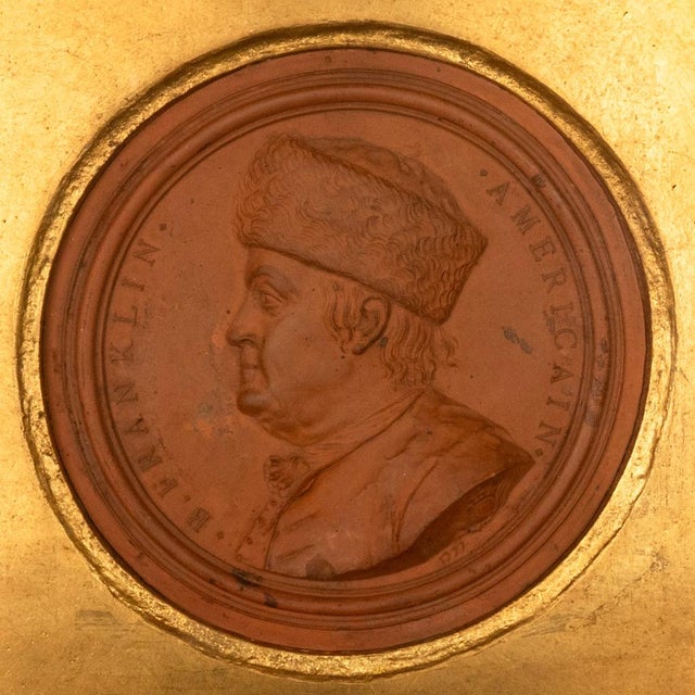 An important 18th century terracotta portrait roundel of Benjamin Franklin, by Jean-Baptiste Nini (1717-1786), signed and...