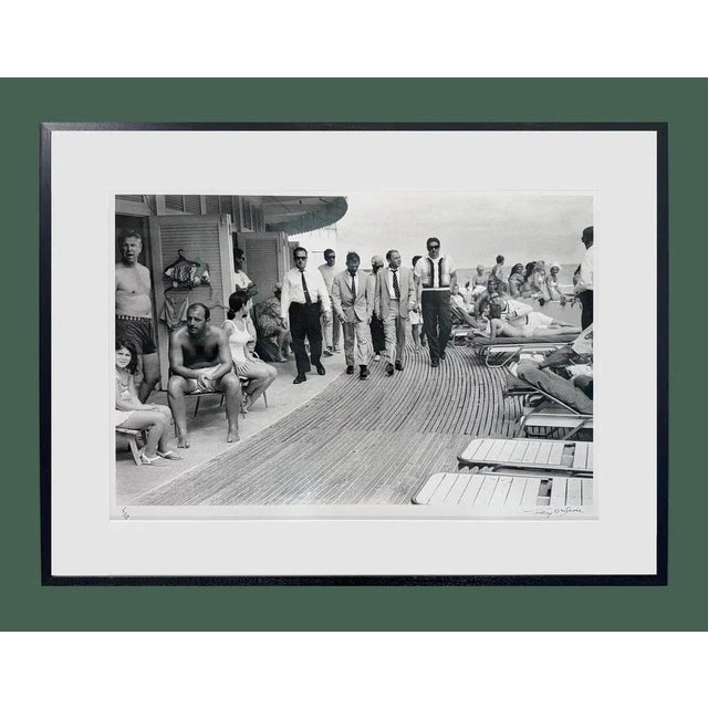 Frank Sinatra In Miami by Terry O'Neill Singer and actor Frank Sinatra, with his minders and his stand in (who is wearing...