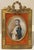 Finely executed hand-painted miniature portrait depicting Napoleon Bonaparte in military uniform with its original Empire...