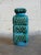 This vintage ceramic vase features an eye-catching rectangular form with a highly textured, relief geometric design across...