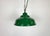 Industrial green enamel factory pendant light made in United Kingdom during the 1960s. White enamel inside the shade....