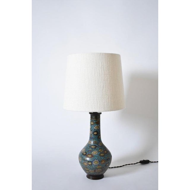 Pair of blue cloisonné bronze lamps, XIXth c. Height: 34 cm - 13.39 in Diameter: 17 cm - 6.69 in Height with lampshade: 64...