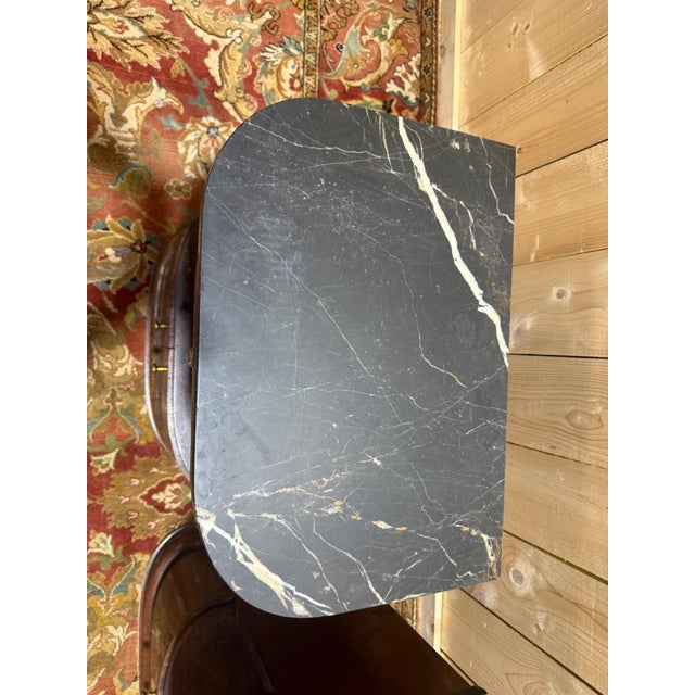 Pair of Art Deco bedside tables. Constructed of solid mahogany and mahogany veneer, with a cylindrical shape...