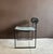The iconic mario botta "prima" chair, manufactured by alias, 1982, italy. black enameled steel, polyurethane foam...