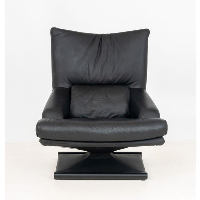 Mathias Hoffmann for Rolf Benz Model 6500 Swivel Lounge Chair, in black leather with adjustable seat on square base. 40" H...