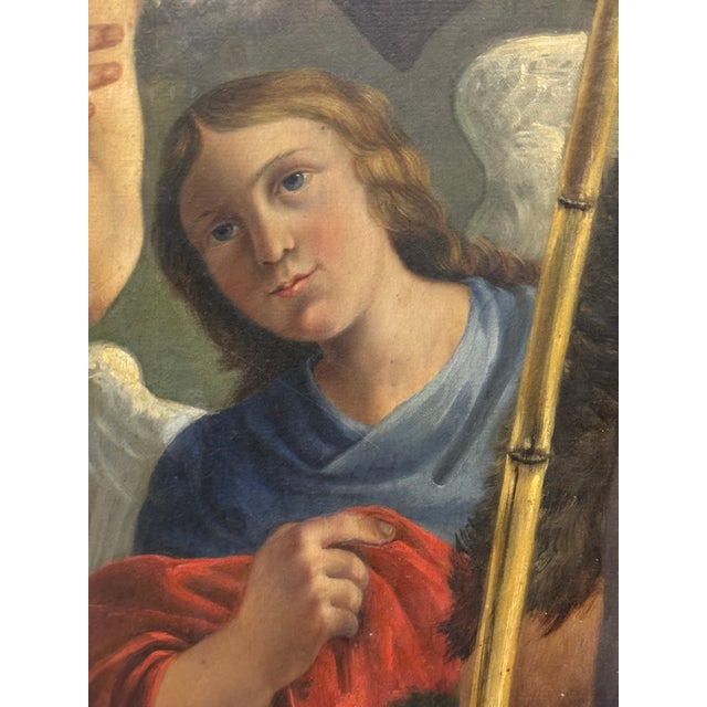 Large arched oil painting on canvas depicts the baptism of Jesus by John the Baptist in a landscape setting. This piece is...